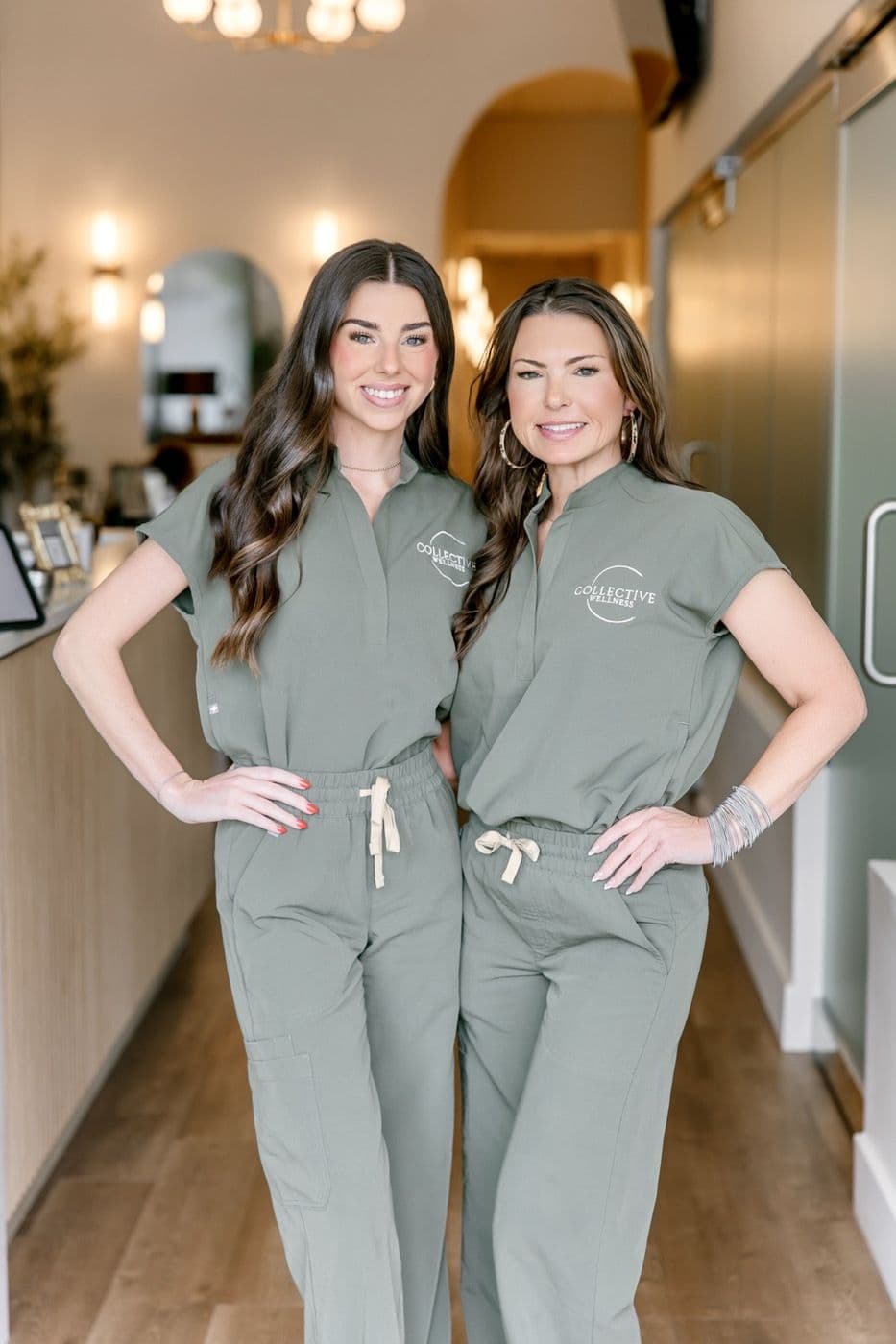 Two members of our team posing in the clinic hallway