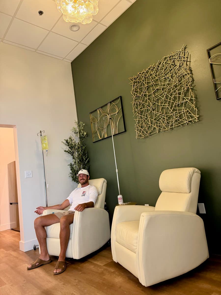 A patient relaxing during IV therapy in our lounge
